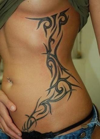 20 Hottest Tribal Tattoo Designs For Women & Men - Her Style Code