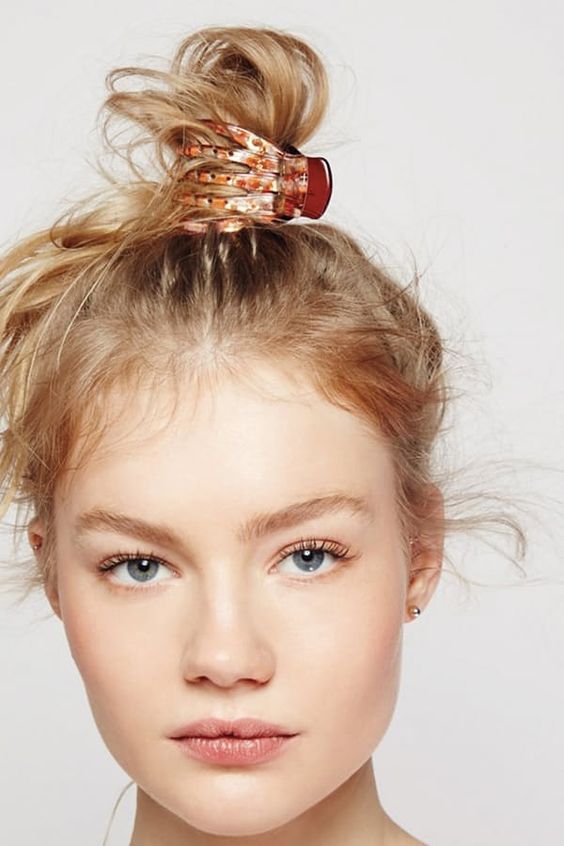 7 Easy Hairstyles You Can Do with a Claw Clip via @PureWow
