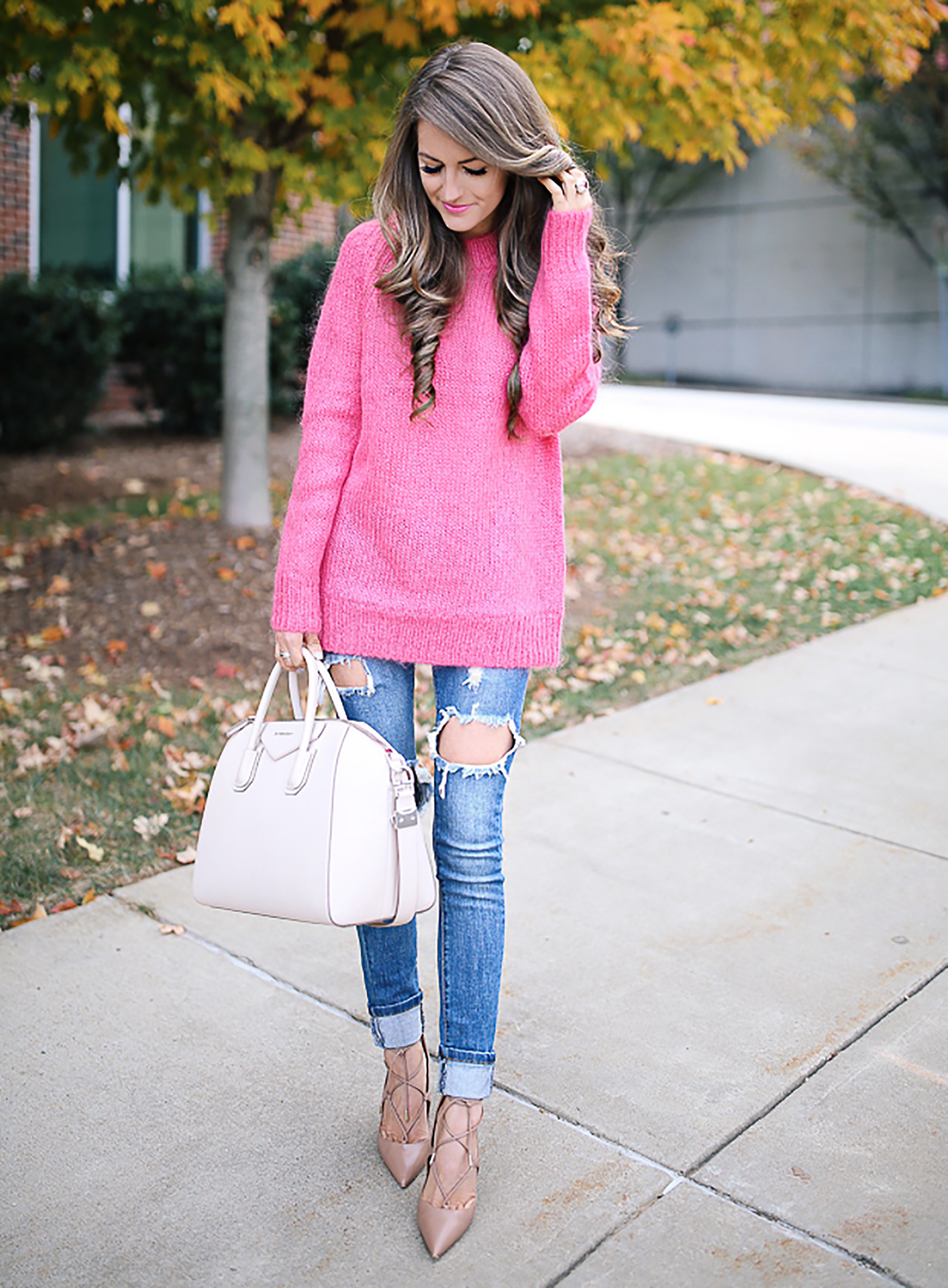 Sydne Style shows pink outfit ideas for fall with fashion blogger southern curls pearls in hot pink sweater