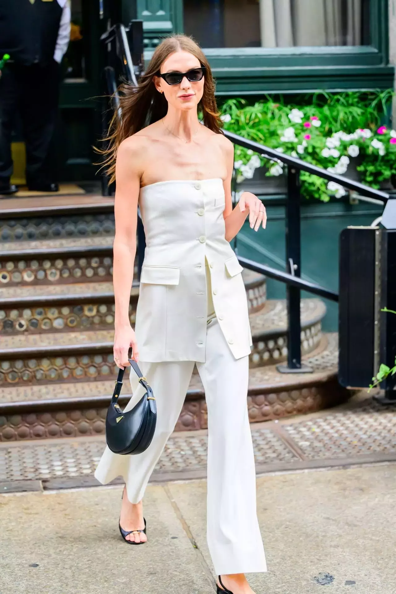 Karlie Kloss Stuns In Chic White Pantsuit At Tribeca Film Festival