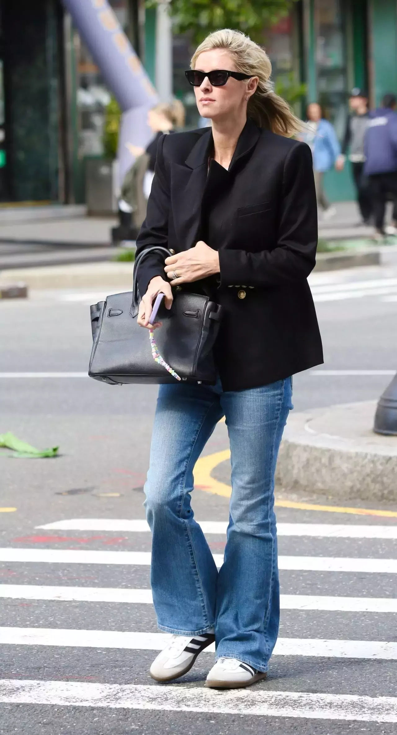 Nicky Hilton Wearing A Black Blazer Jeans And Adidas Sneakers Manhattan S Soho Area