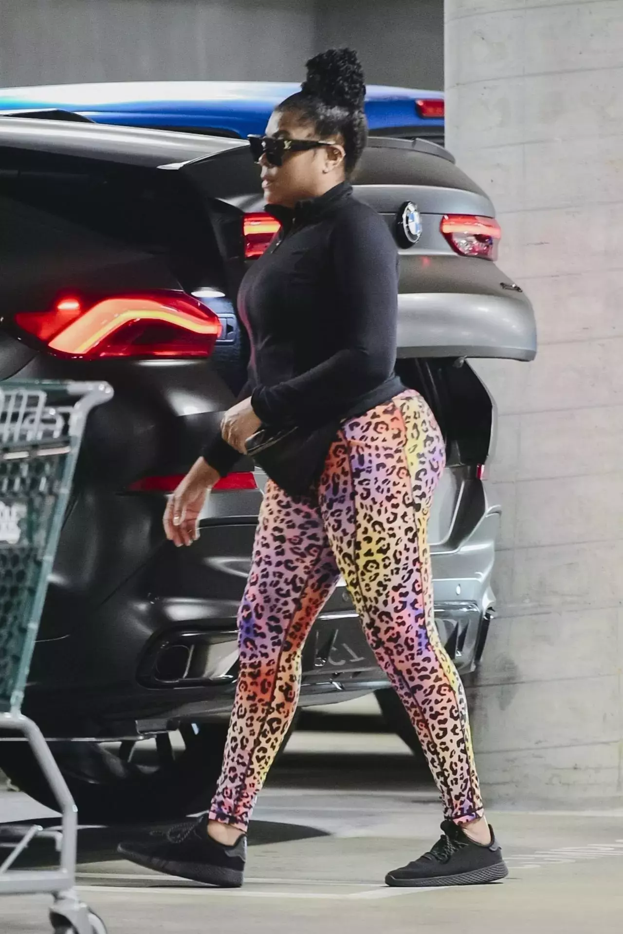 Taraji P Henson Wearing Sunglasses And Animal Print Leggings In Los Angeles