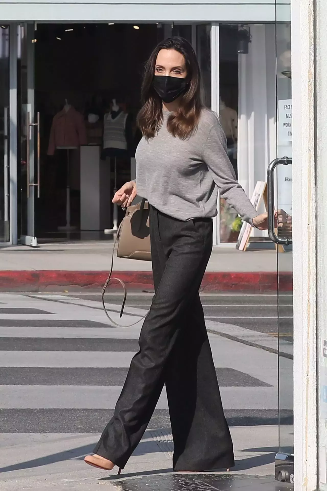 Angelina Jolie Shops For Sunglasses At Optometrix Professional Eye Care Center In Beverly Hills