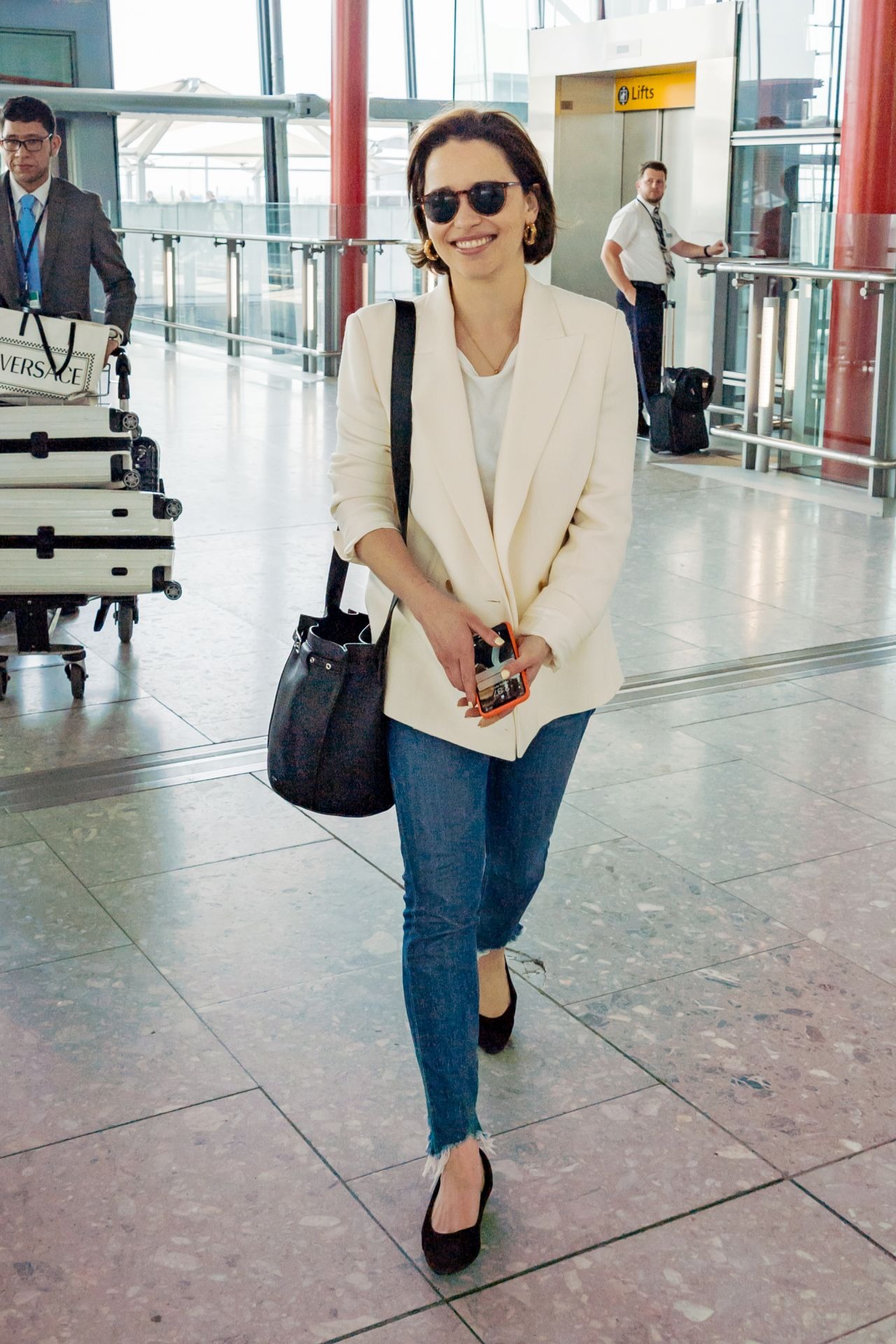 Emilia Clarke In Travel Outfit Heathrow Airport In London