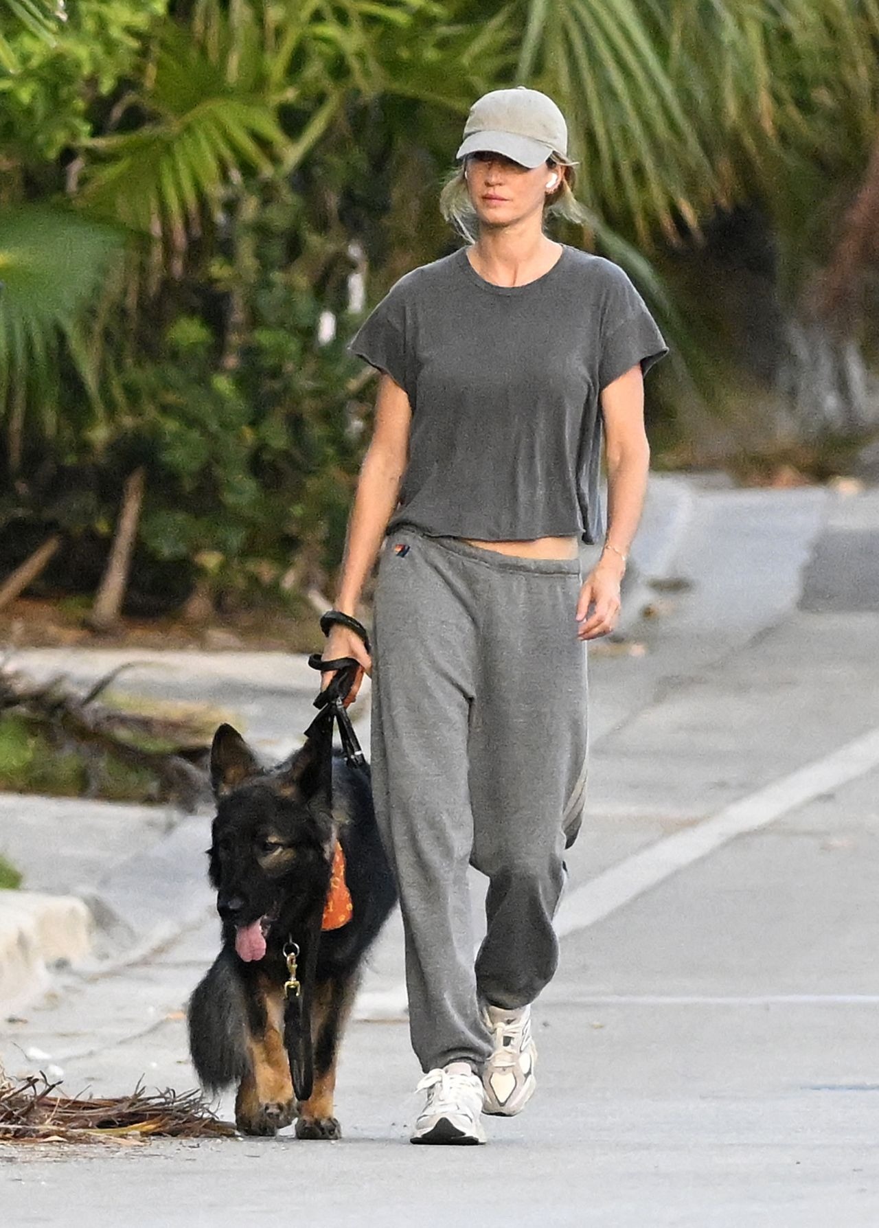 Gisele Bundchen Walks Her Dog Near Her Home In Surfside