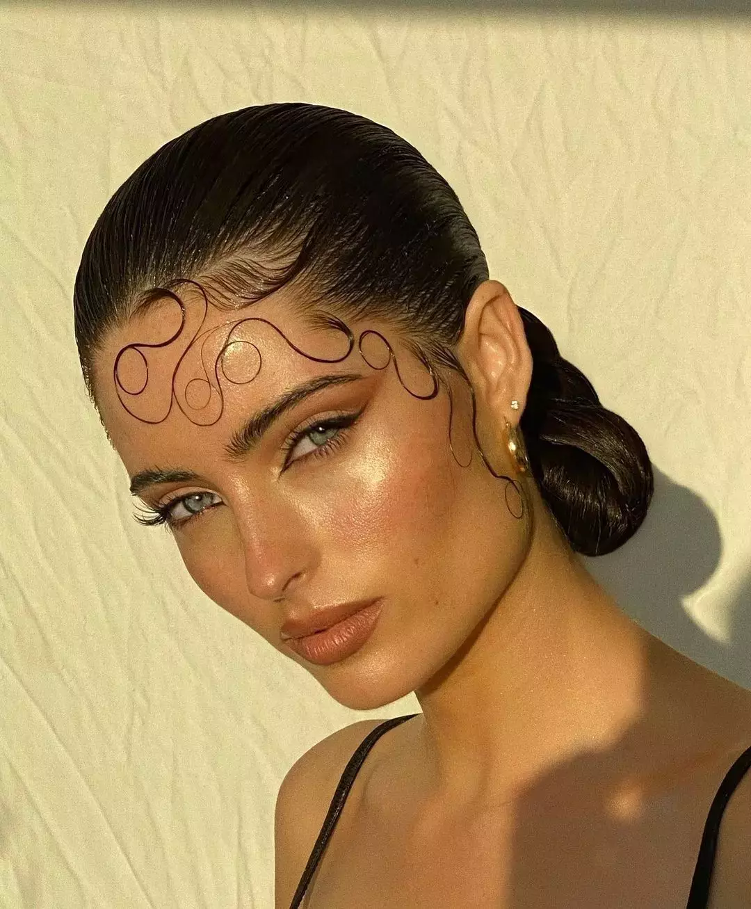 Festival Hair Idea Swirly Slicked Back Bun