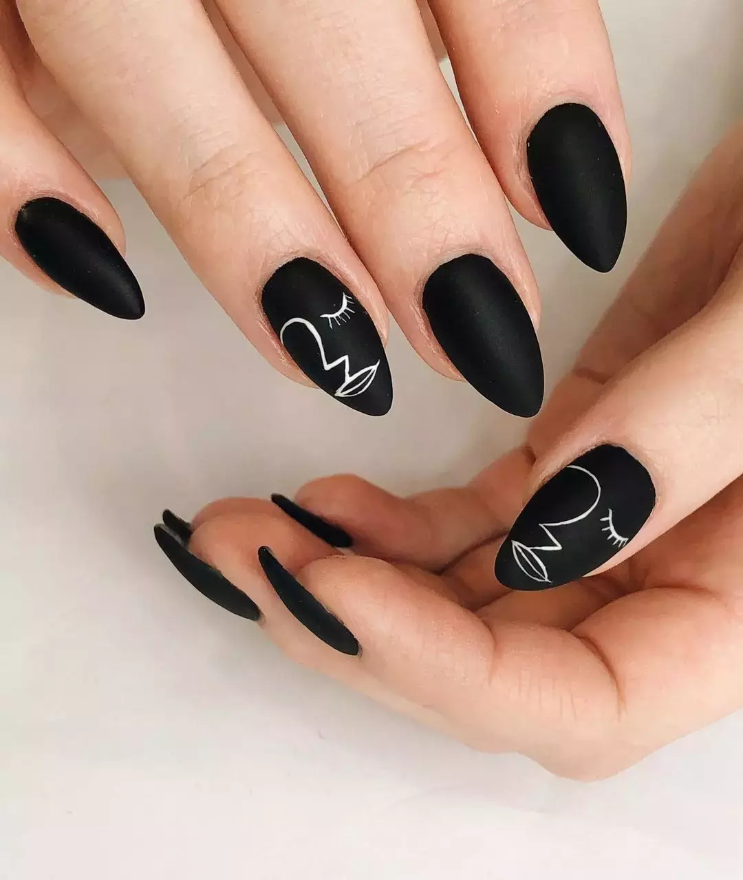 Matte Black Nails With Portrait Nail Art