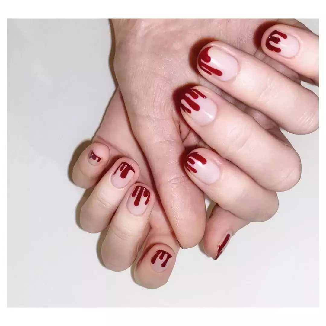 These Halloween Inspired Burgundy Nails