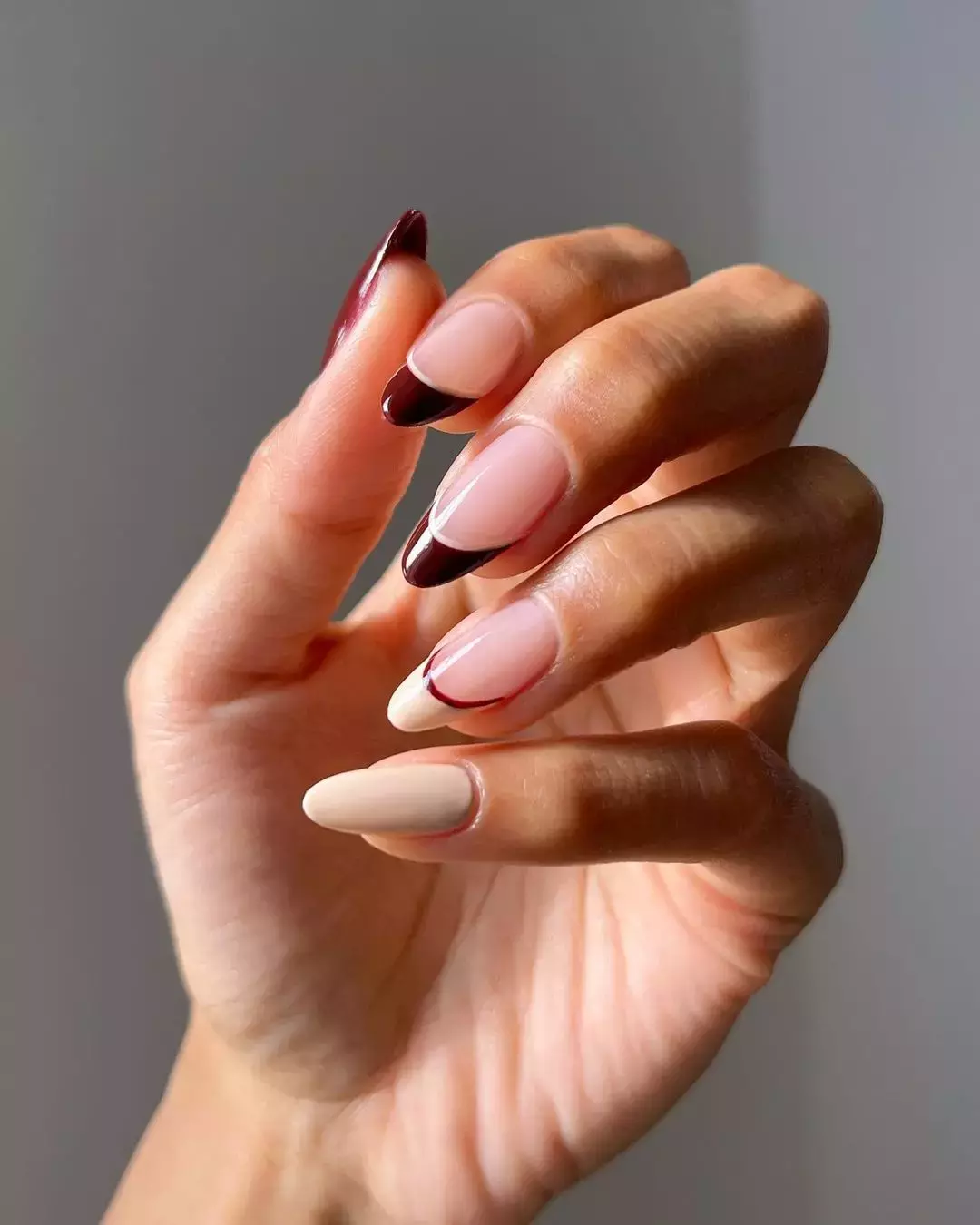 This Burgundy And Cream French Manicure