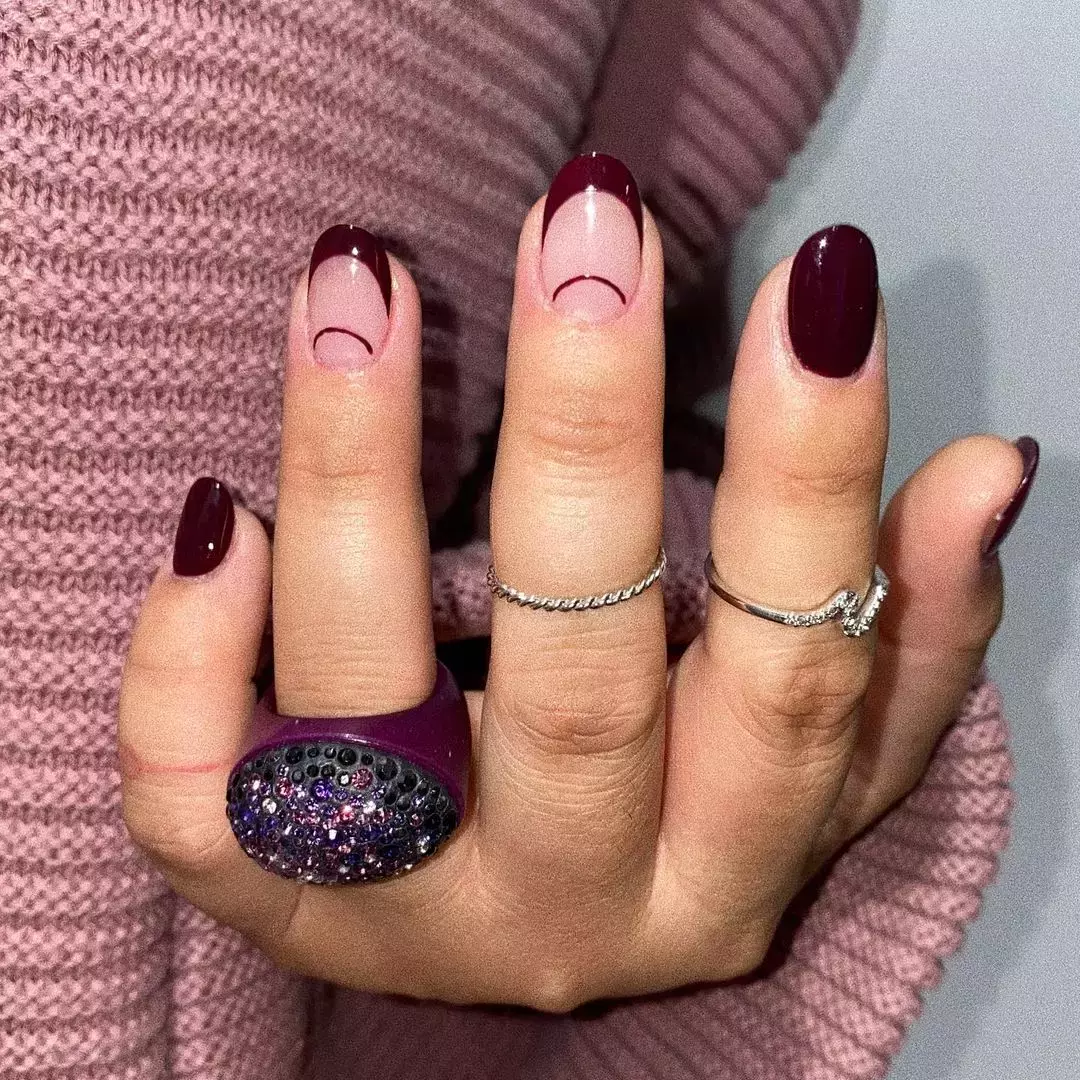 This Negative Space Burgundy Nail Art