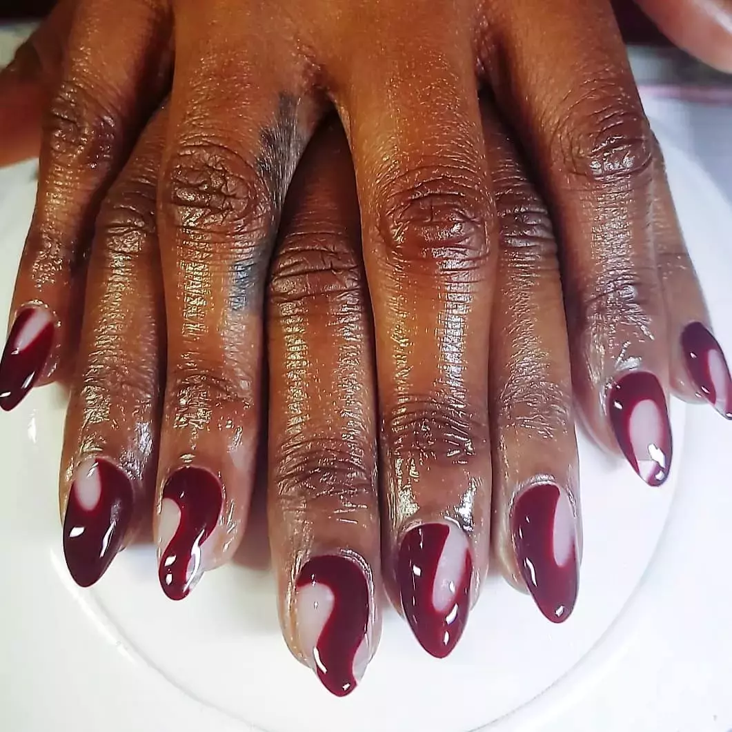 This Wavy Burgundy Manicure