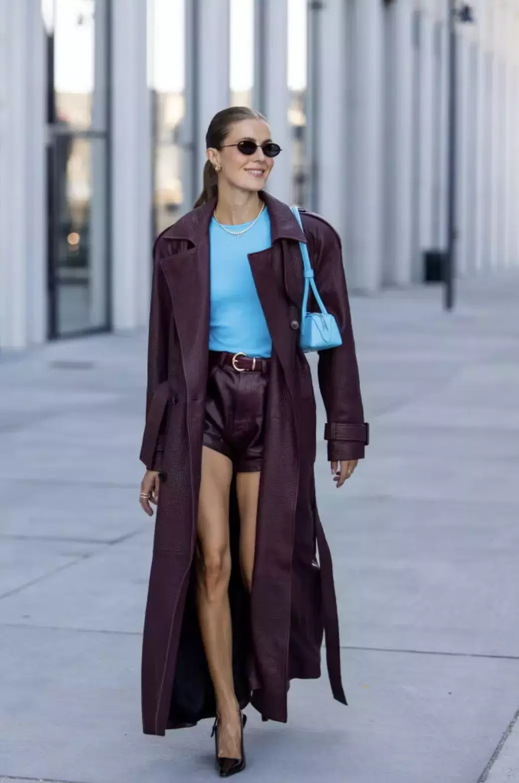 A Burgundy Trench Bright Blue Accents