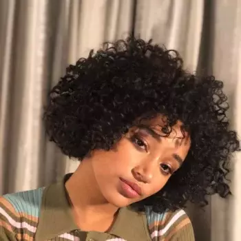 A Curly Bob With Face Framing Pieces