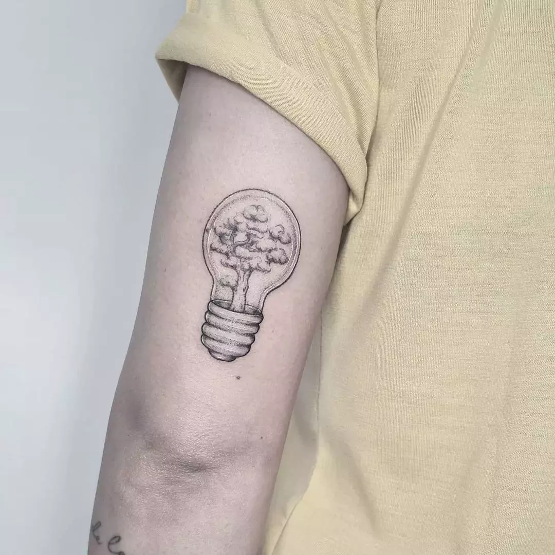 This Lightbulb With Trees Sagittarius Tattoo