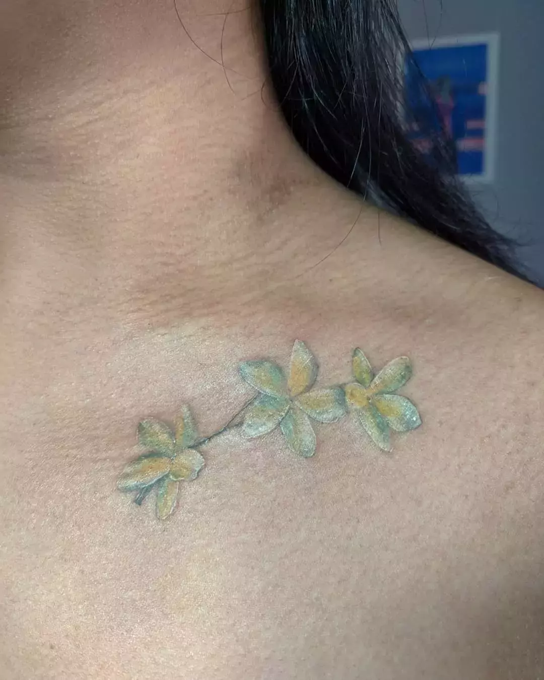 Tiny Flower Tattoo