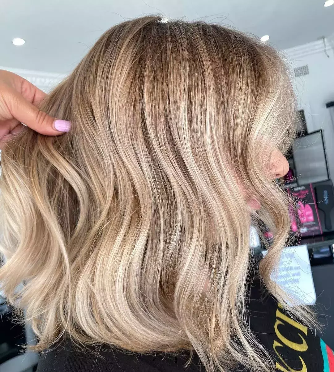 Butterscotch Blonde With Honey Highlights