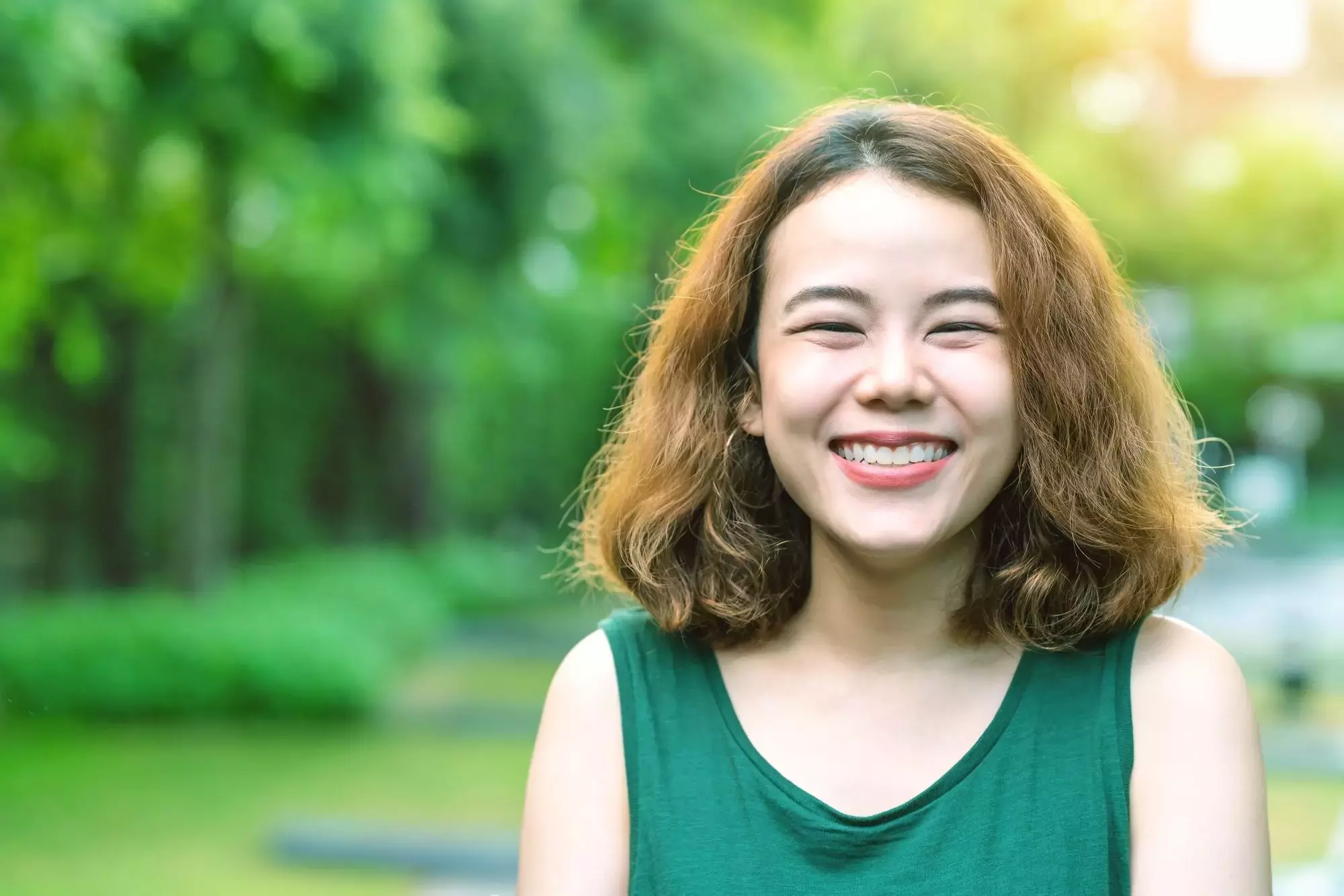 Short Curly Hair With Golden Brown Hair Color