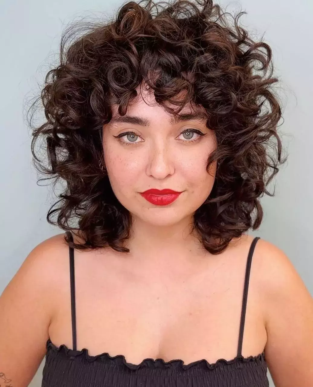 Bold Brown Curls With Bangs