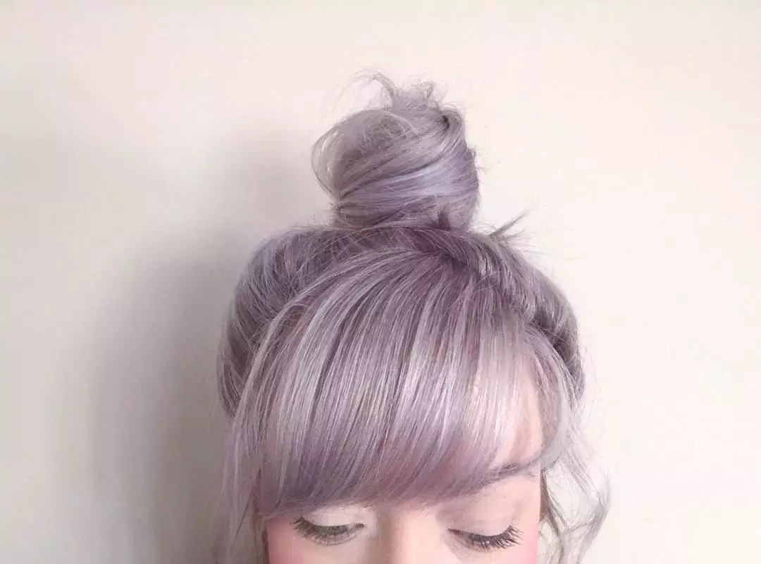 Lavender Top Knot With Wispy Bangs